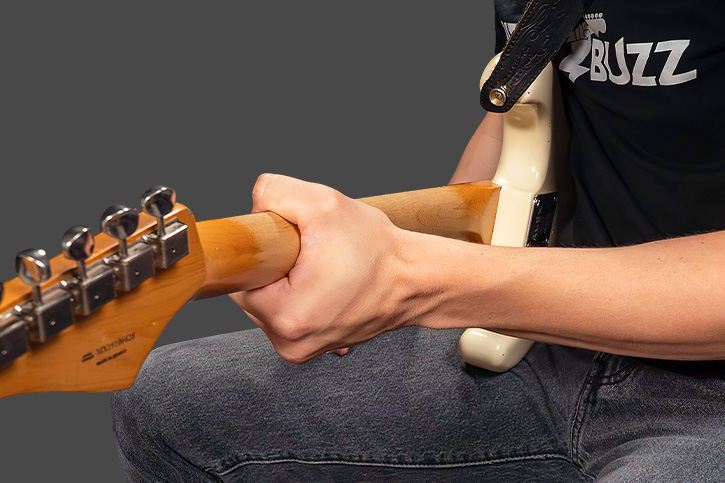 Image of AL doing the baseball bat grip