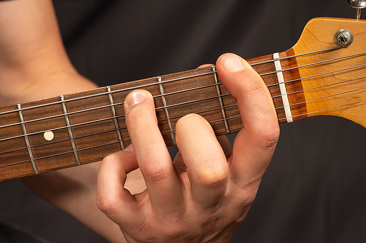 AL playing A power chord