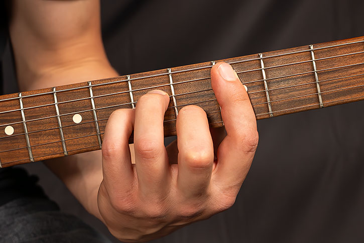picture of AL playing a Cm